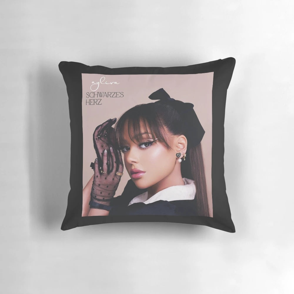 Plush pillow featuring a minimalist ayliva-inspired design in shades of gray and white