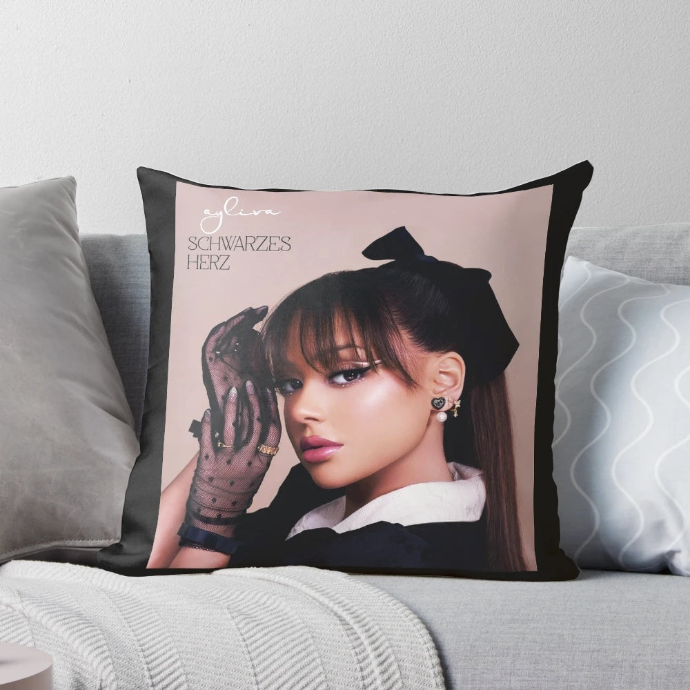 Plush pillow featuring a minimalist ayliva-inspired design in shades of gray and white