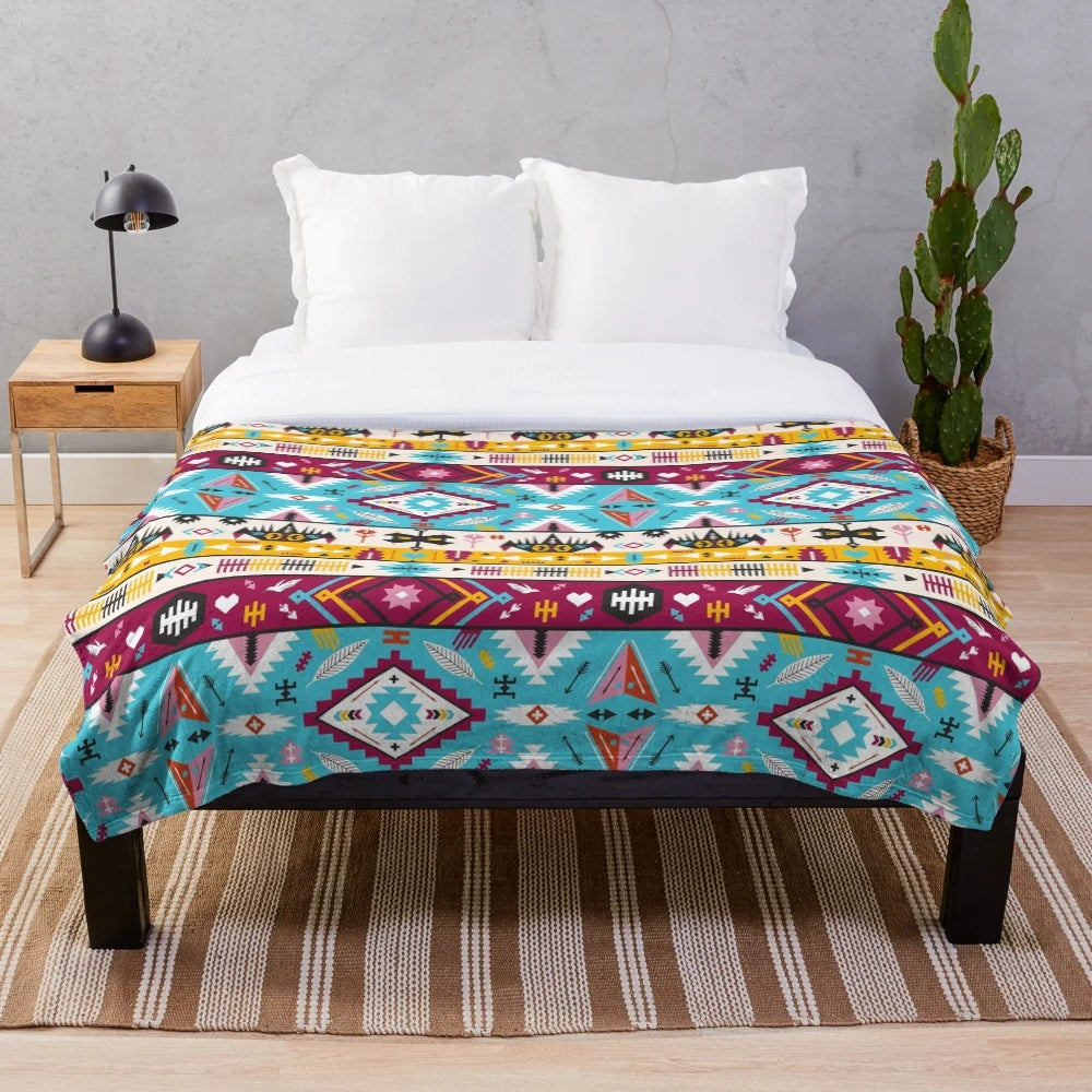 Plush blanket with a seamless tribal aztec pattern