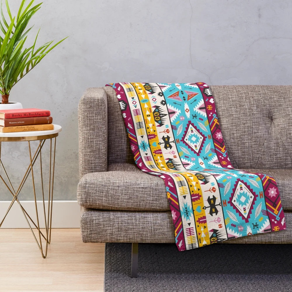 Plush blanket with a seamless tribal aztec pattern