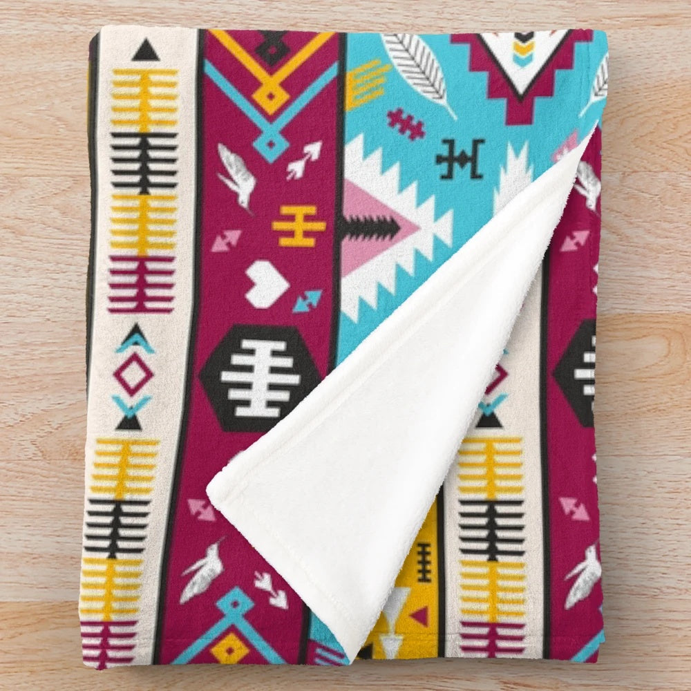 Plush blanket with a seamless tribal aztec pattern
