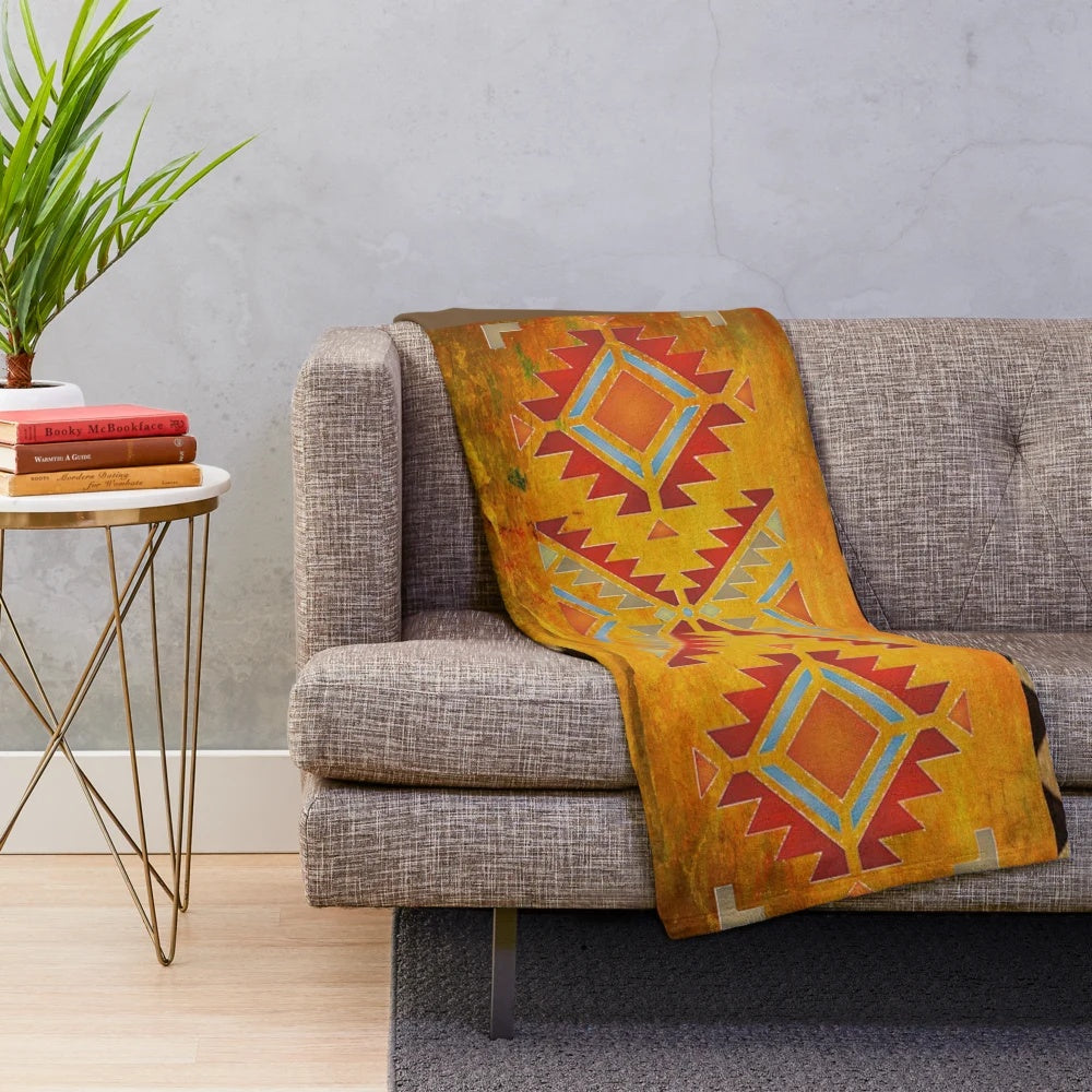 Aztec pattern Navajo plush blanket in warm, earthy tones