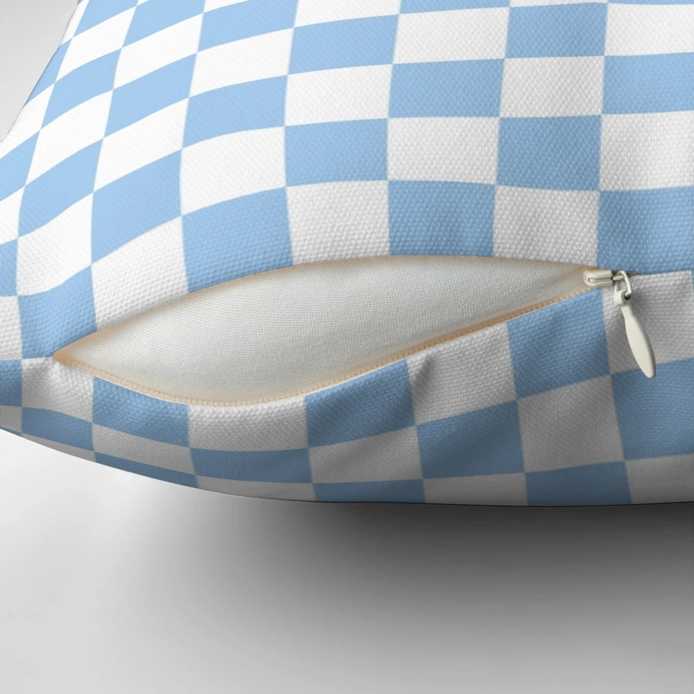 Soft and plush baby blue and white checkered throw pillow for nursery, bedroom, or living room decor.
