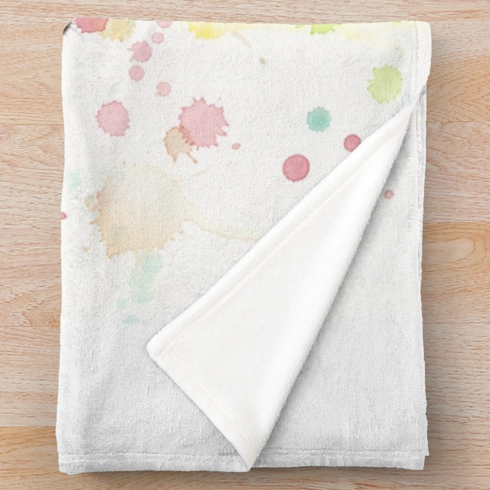 A soft and plush baby giraffe blanket featuring a watercolor painting