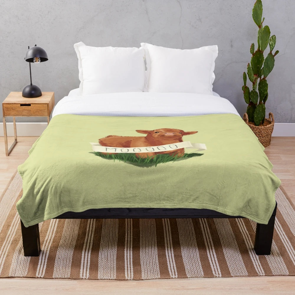 Soft and cuddly baby plush blanket featuring a cute highland cow design