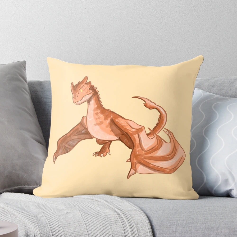 Vibrant orange and yellow baby wyvern pillow with fantasy dragon and dinosaur design