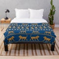 Babylon-inspired plush knitted blanket with Ishtar Gate design