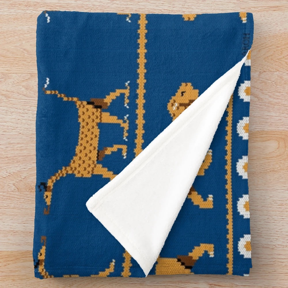 Babylon-inspired plush knitted blanket with Ishtar Gate design