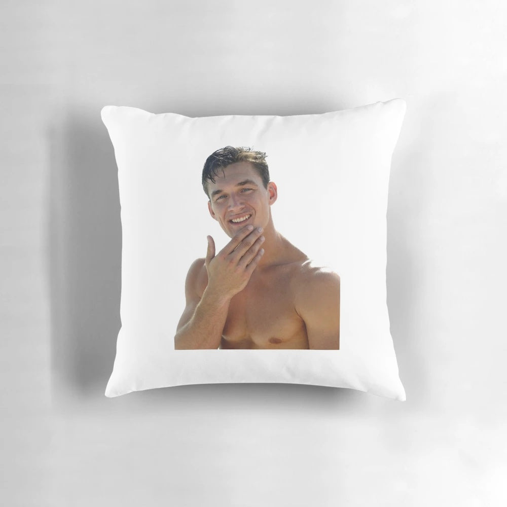 A plush and comfortable pillow featuring a shirtless image of Tyler Cameron, a popular contestant from the Bachelor franchise.
