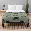 Plush blanket with a badger pattern in a forest-inspired design