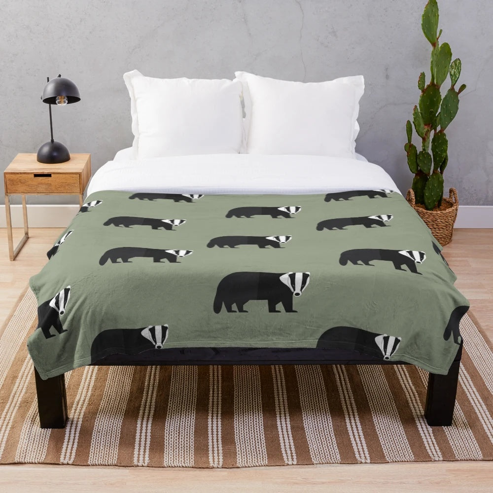 Plush blanket with a badger pattern in a forest-inspired design