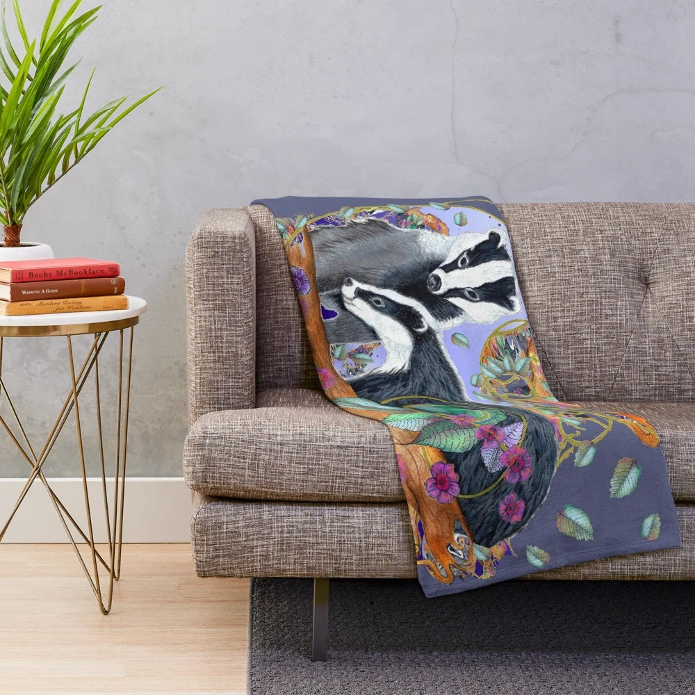 Soft and cuddly badger plush blanket with a forest scene design