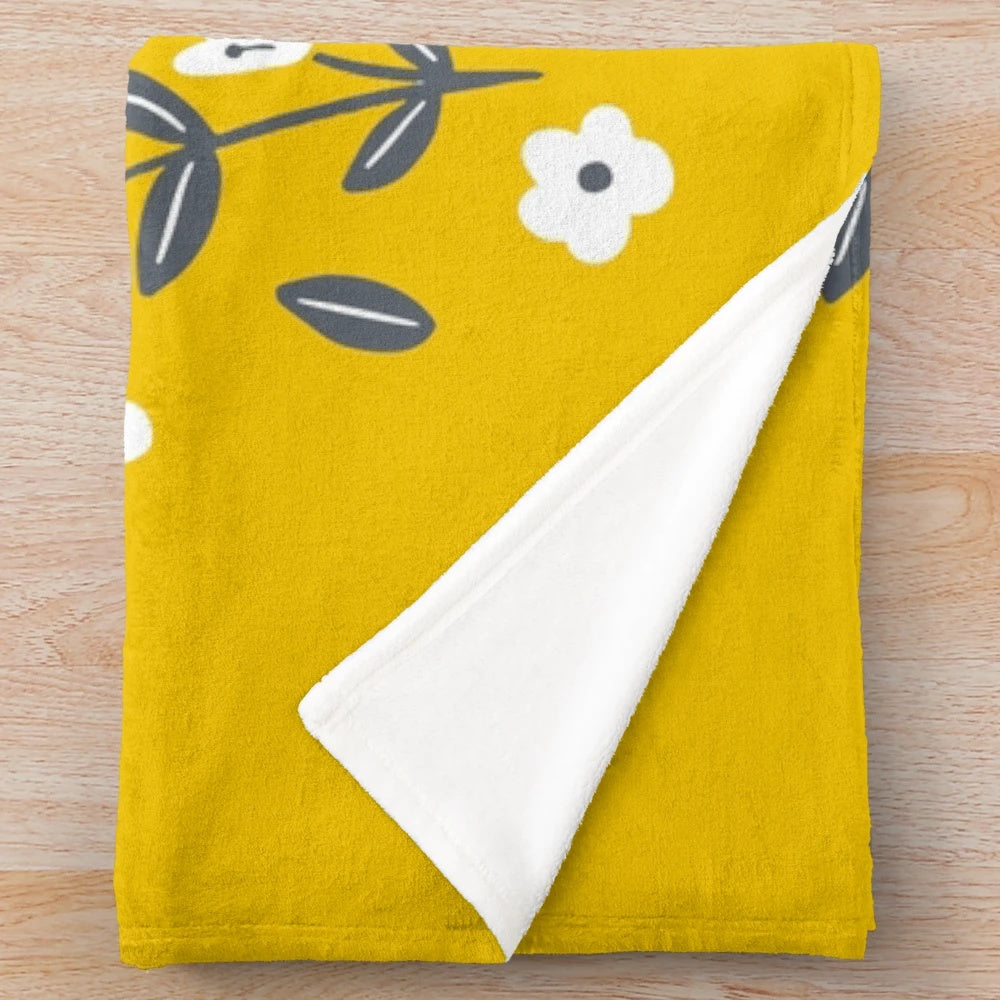Soft and plush badgers blanket in yellow and gray colors
