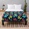 Soft and cuddly plush blanket with balloon dog design