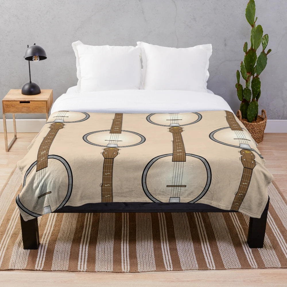 Banjo plush blanket featuring a musical instrument design
