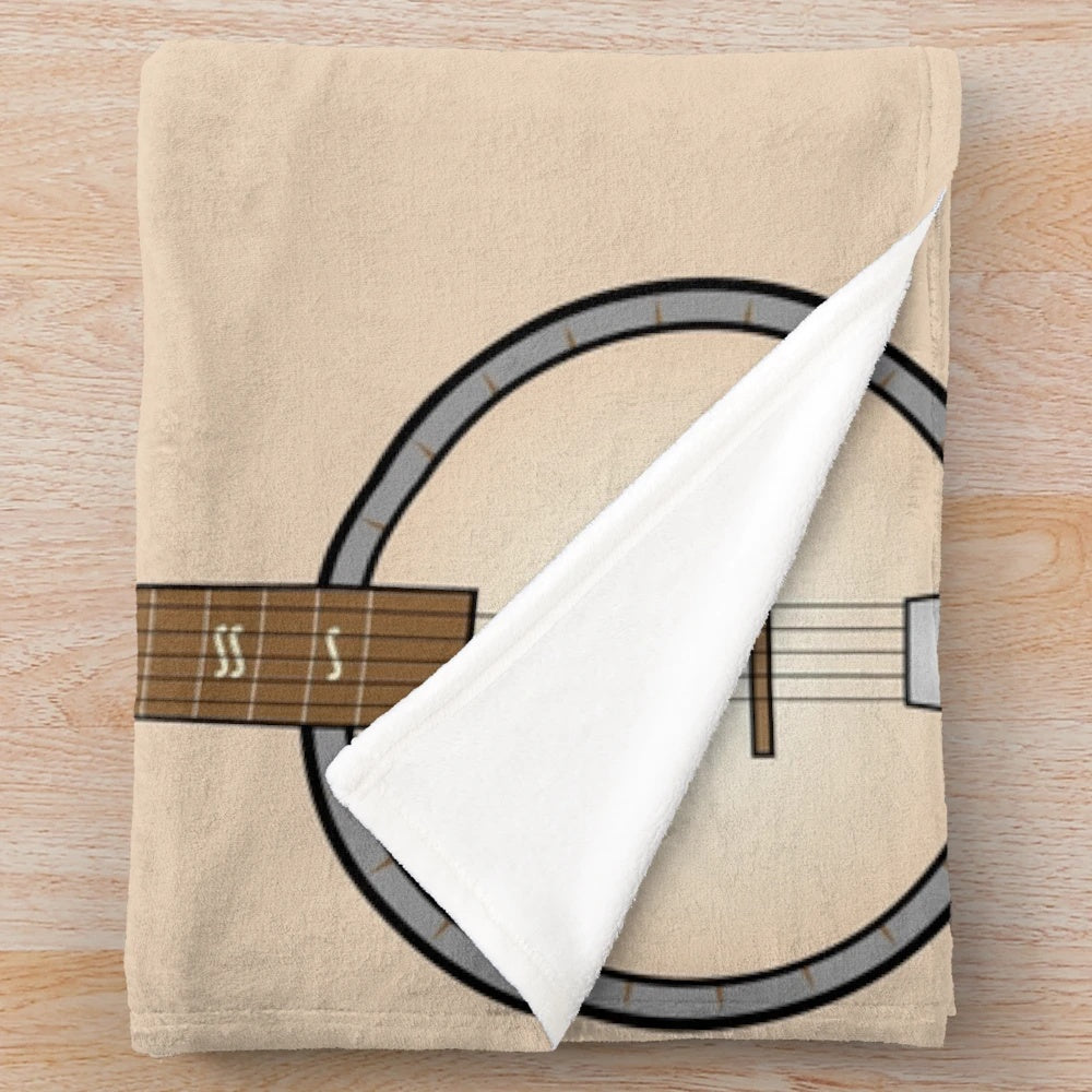 Banjo plush blanket featuring a musical instrument design