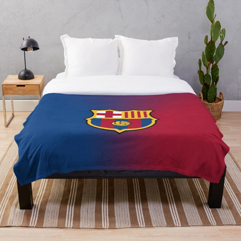 Barcelona-inspired plush blanket with football design