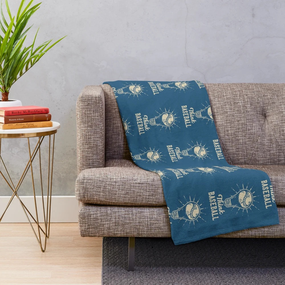 Baseball-themed plush blanket with a light bulb design