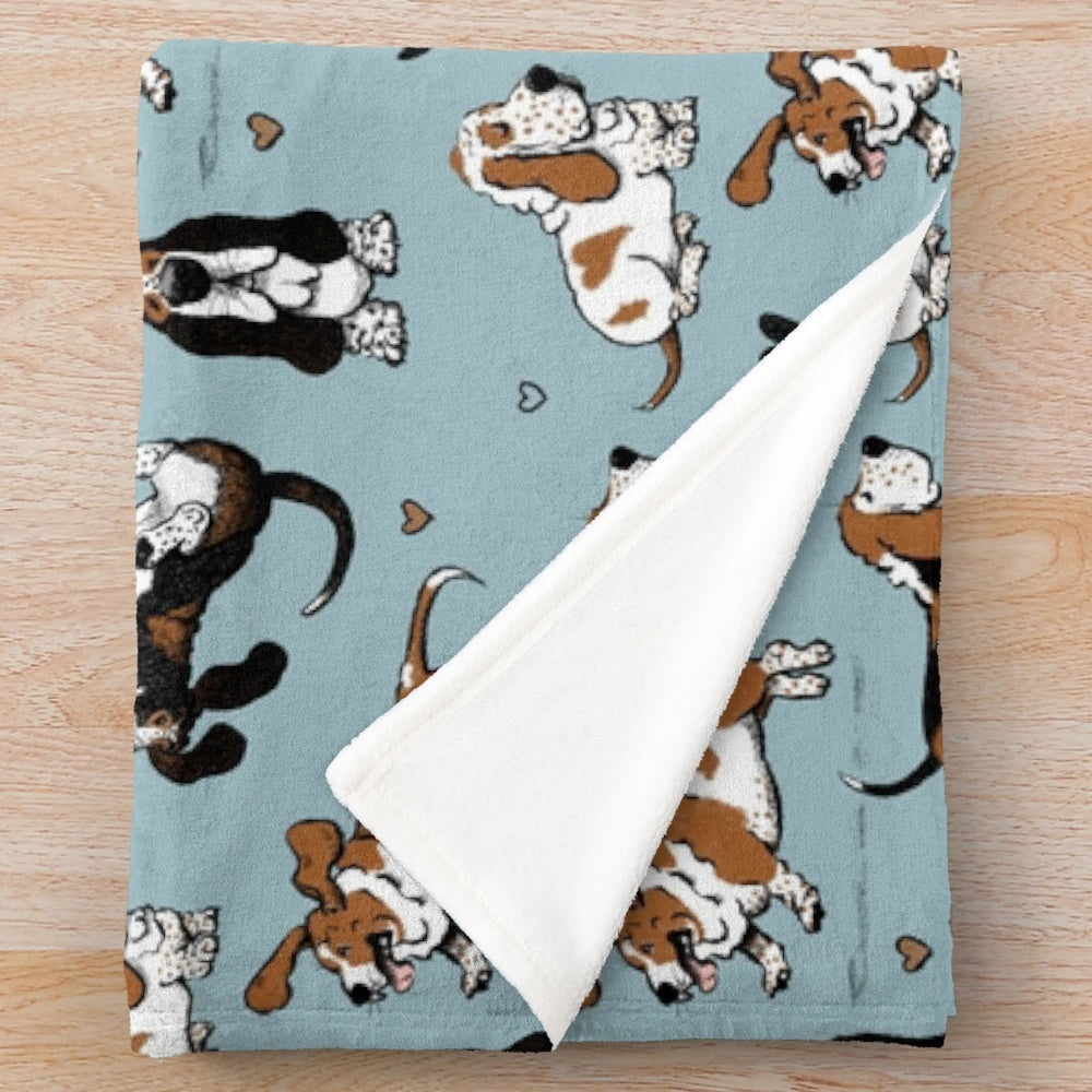 Soft and cuddly plush blanket featuring adorable basset hound puppies