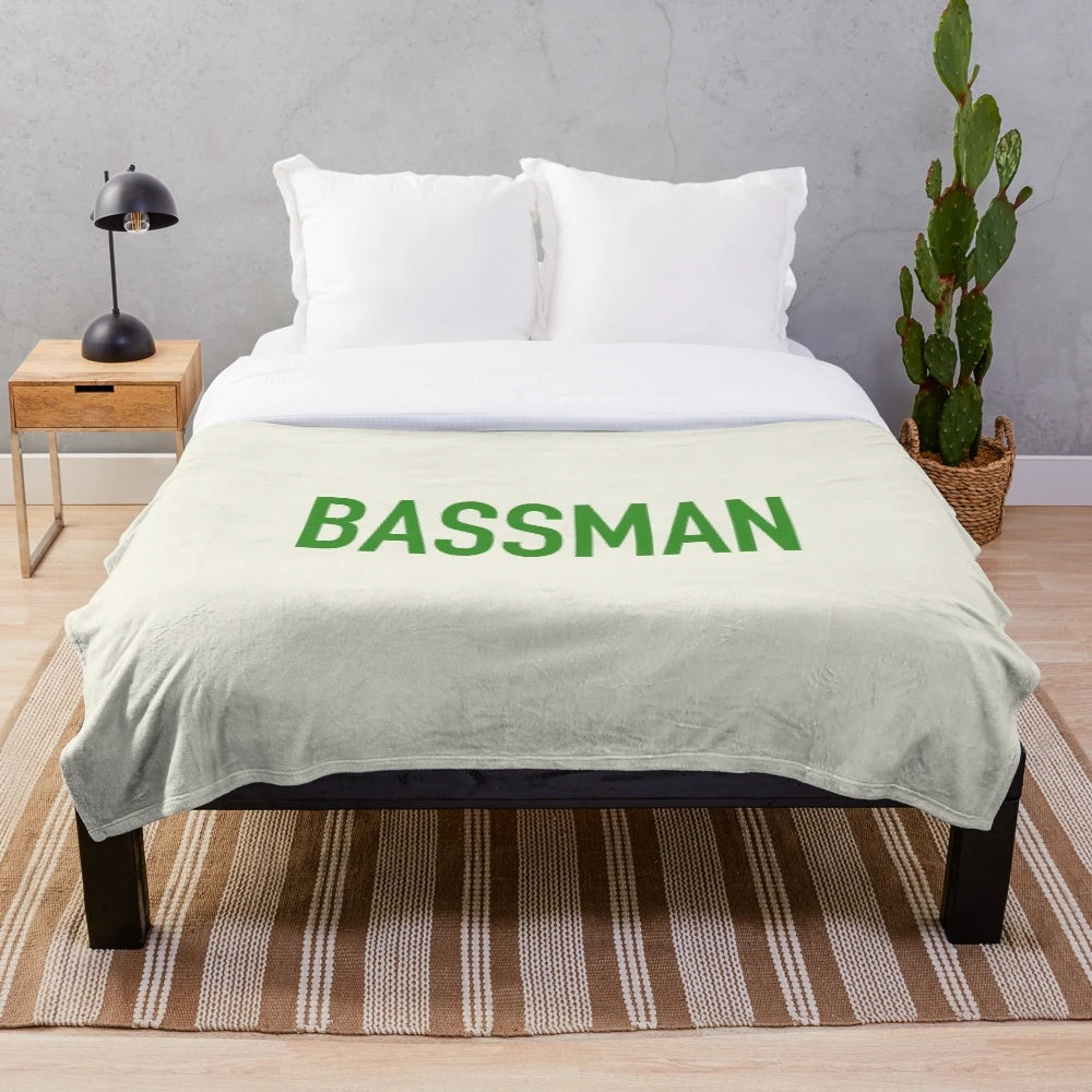 Bassman-inspired plush blanket featuring the iconic Beatles' music imagery