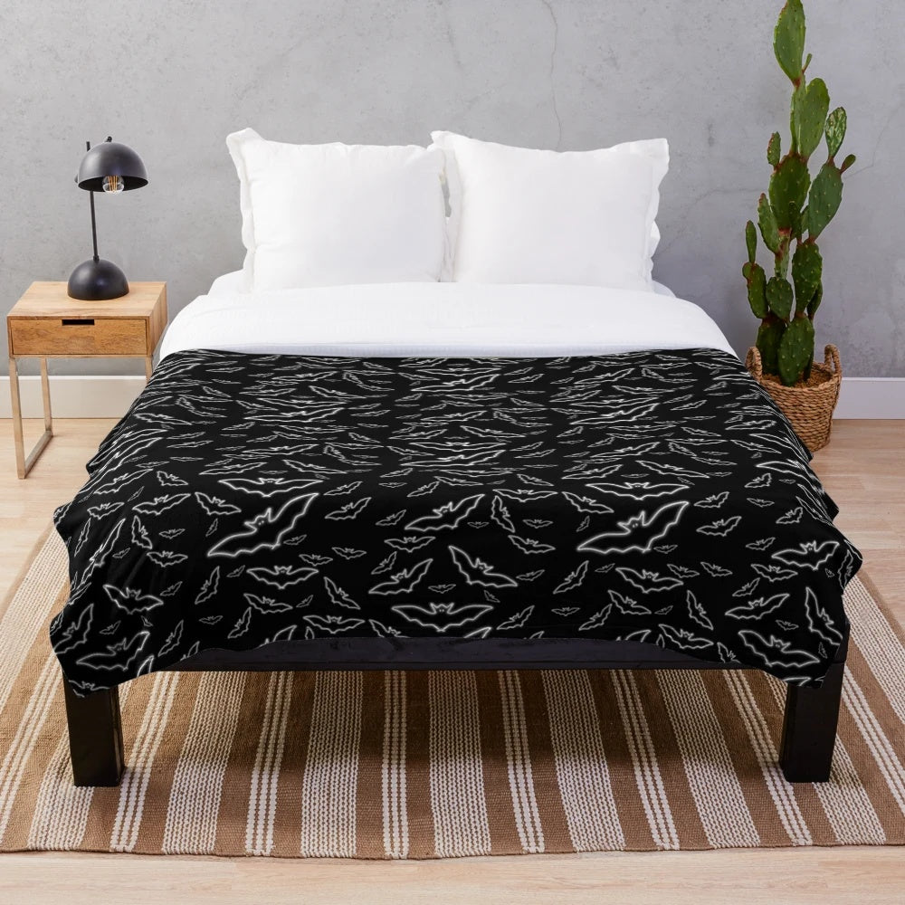 Soft and cozy plush blanket with a cute bat pattern, perfect for gothic, Halloween, and Christmas decor