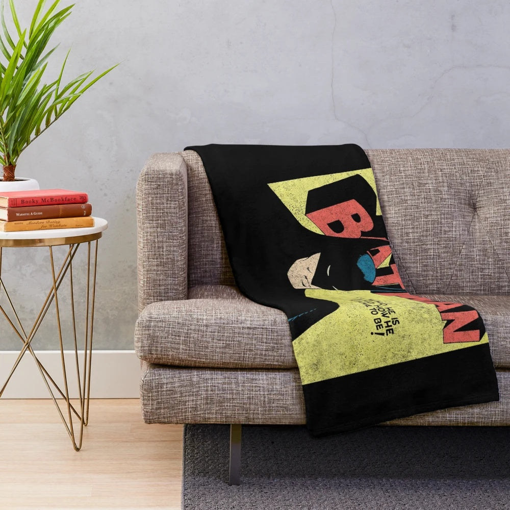Bat-themed plush blanket with retro comic book design
