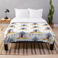 Beach hut themed plush blanket with coastal design elements