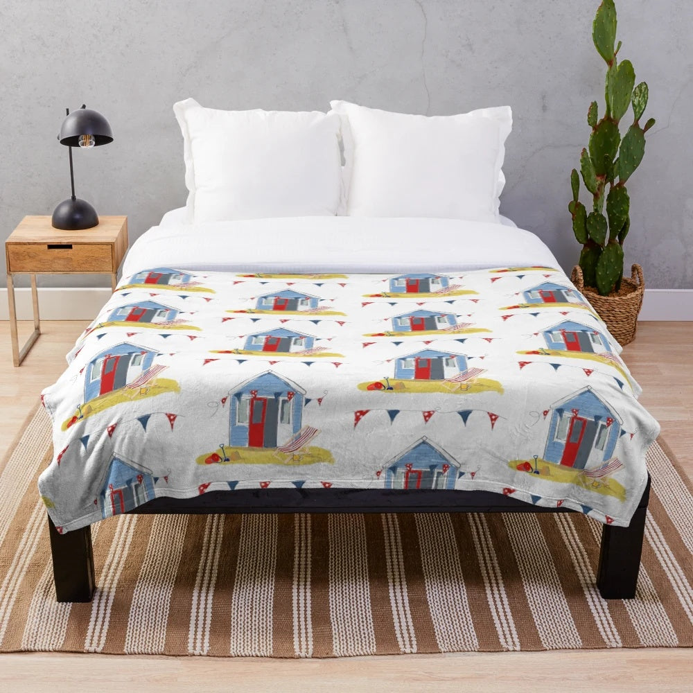 Beach hut themed plush blanket with coastal design elements