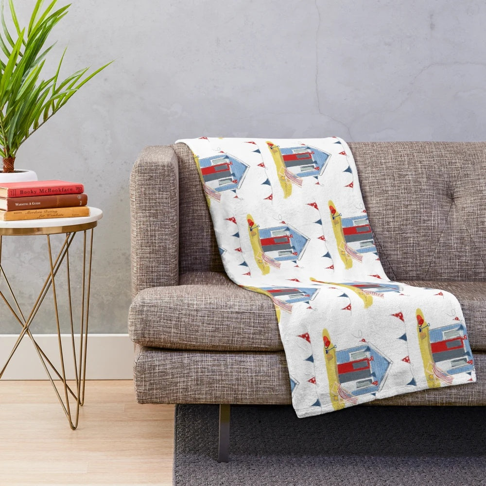 Beach hut themed plush blanket with coastal design elements