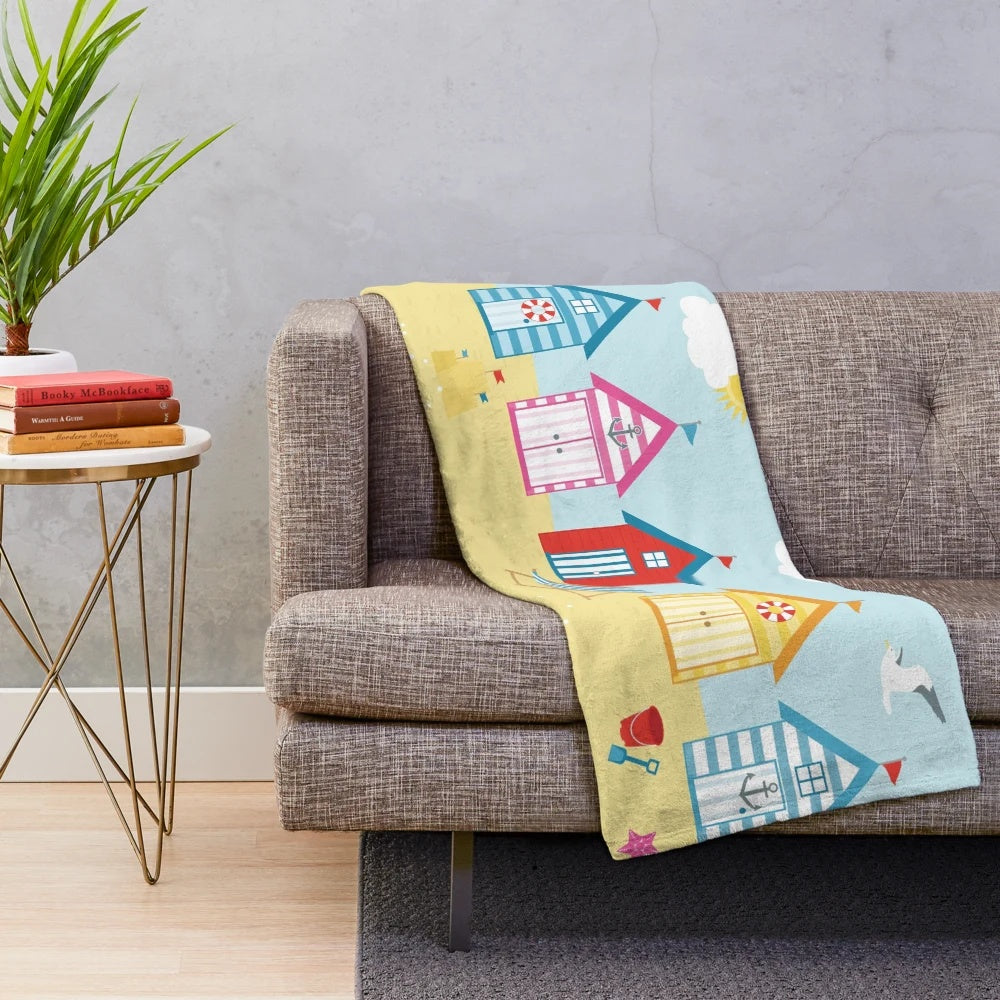 Plush blanket featuring a serene beach hut scene