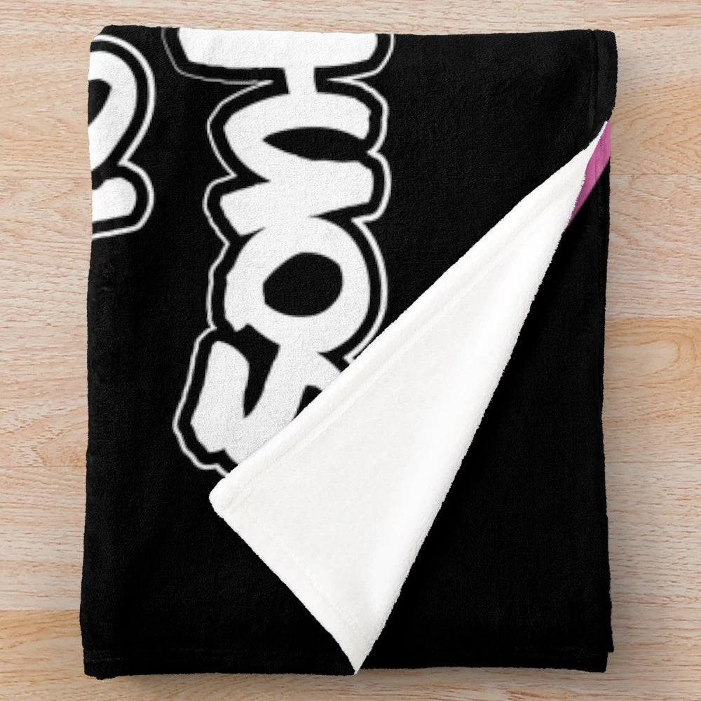 Beach umbrella-inspired plush blanket for outdoor relaxation