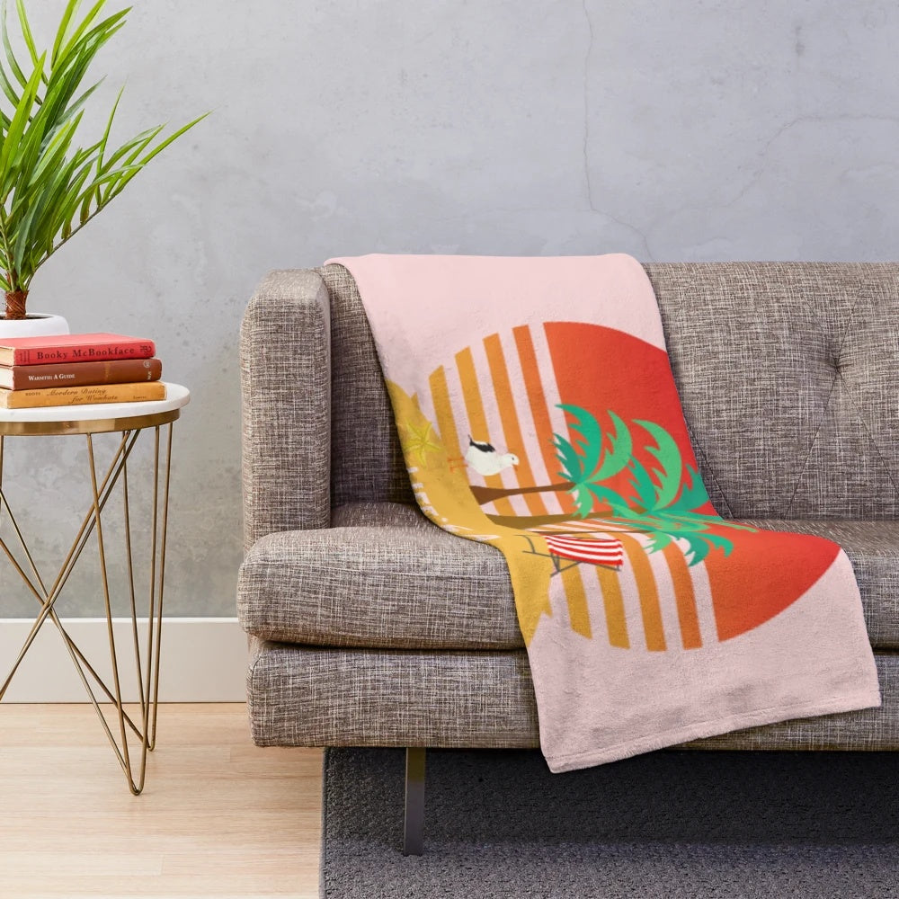 Plush blanket with tropical beach design