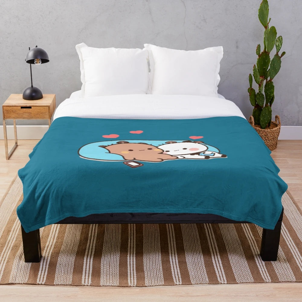 Soft and cuddly bear and panda plush blanket