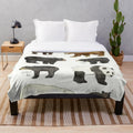 Plush bear blanket with nature-inspired design