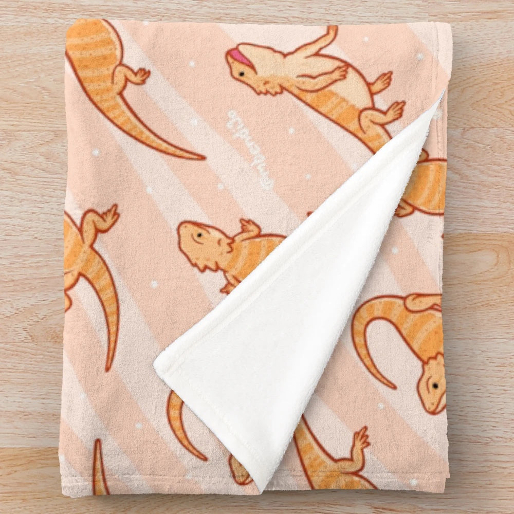 Bearded dragon plush blanket with a repeating pattern design