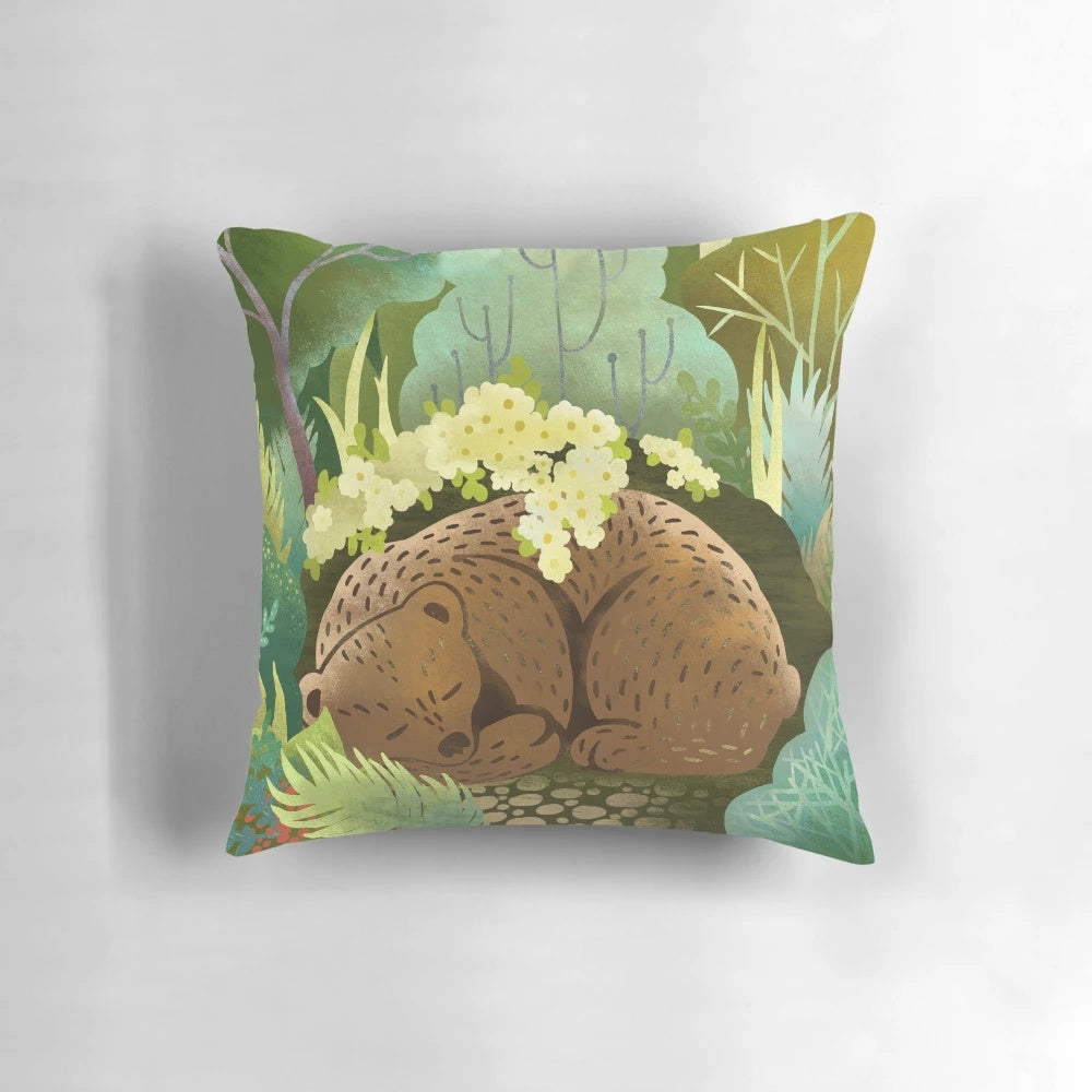 Plush brown bear pillow with nature-inspired design, perfect for a woodland-themed bedroom.