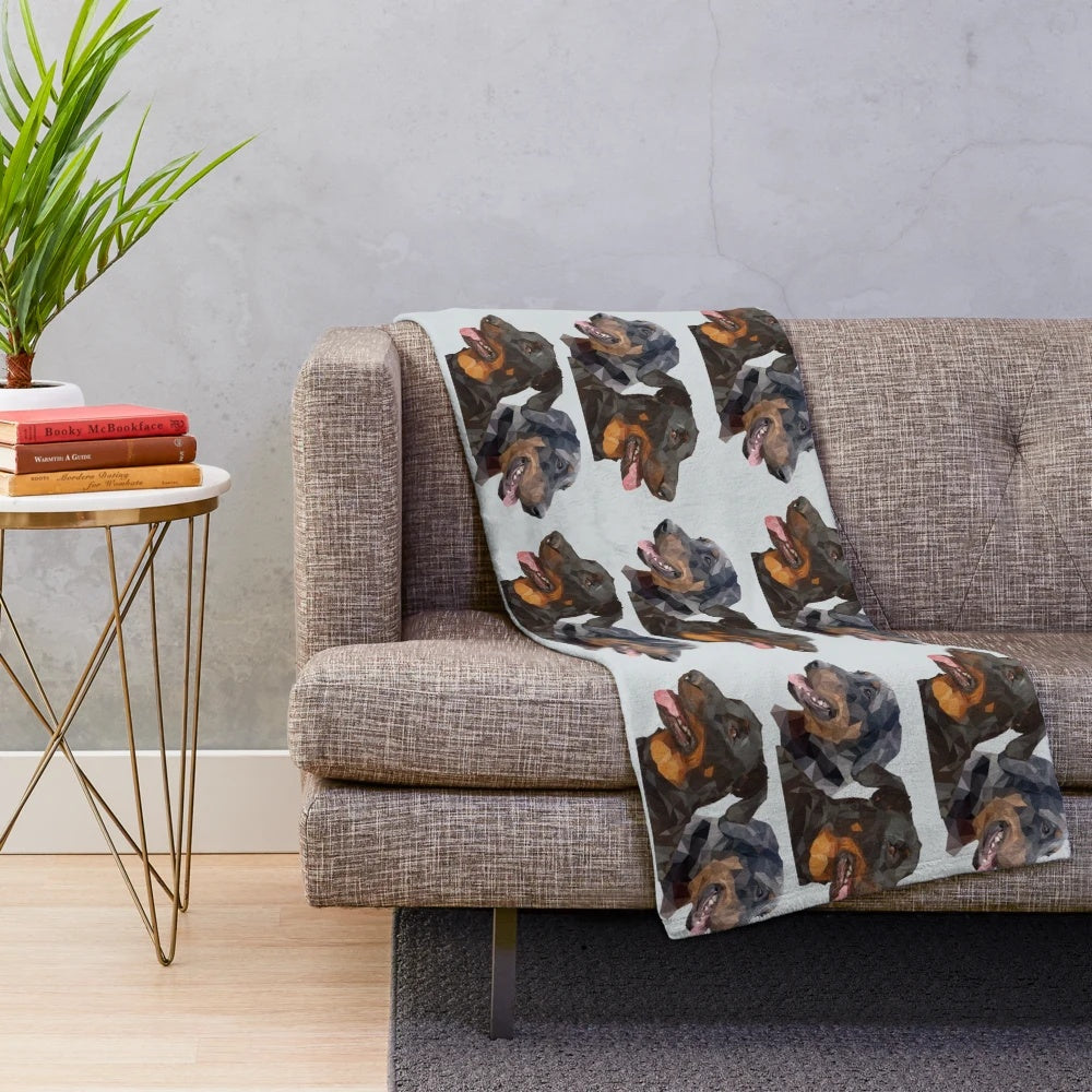 A soft, plush blanket featuring the beautiful Beauceron dog breed
