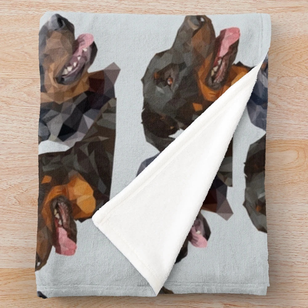 A soft, plush blanket featuring the beautiful Beauceron dog breed
