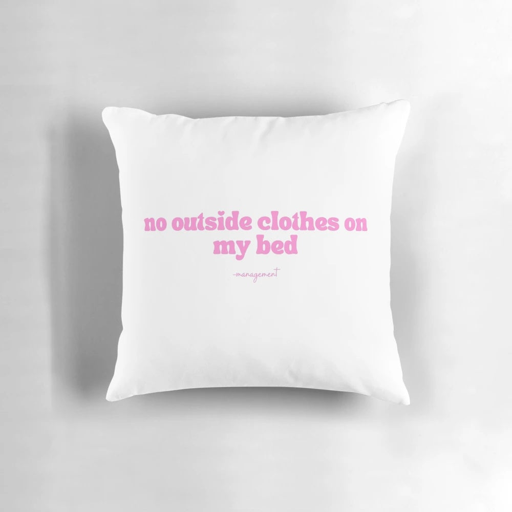 Soft, comfortable pillow for bedroom decor, featuring "no outside clothes on bed" design.