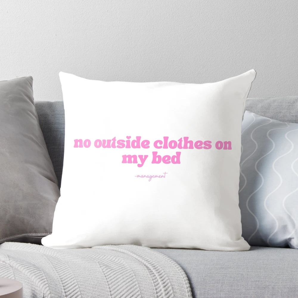 Soft, comfortable pillow for bedroom decor, featuring "no outside clothes on bed" design.