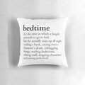 A plush pillow with a whimsical design for book lovers who stay up late reading.