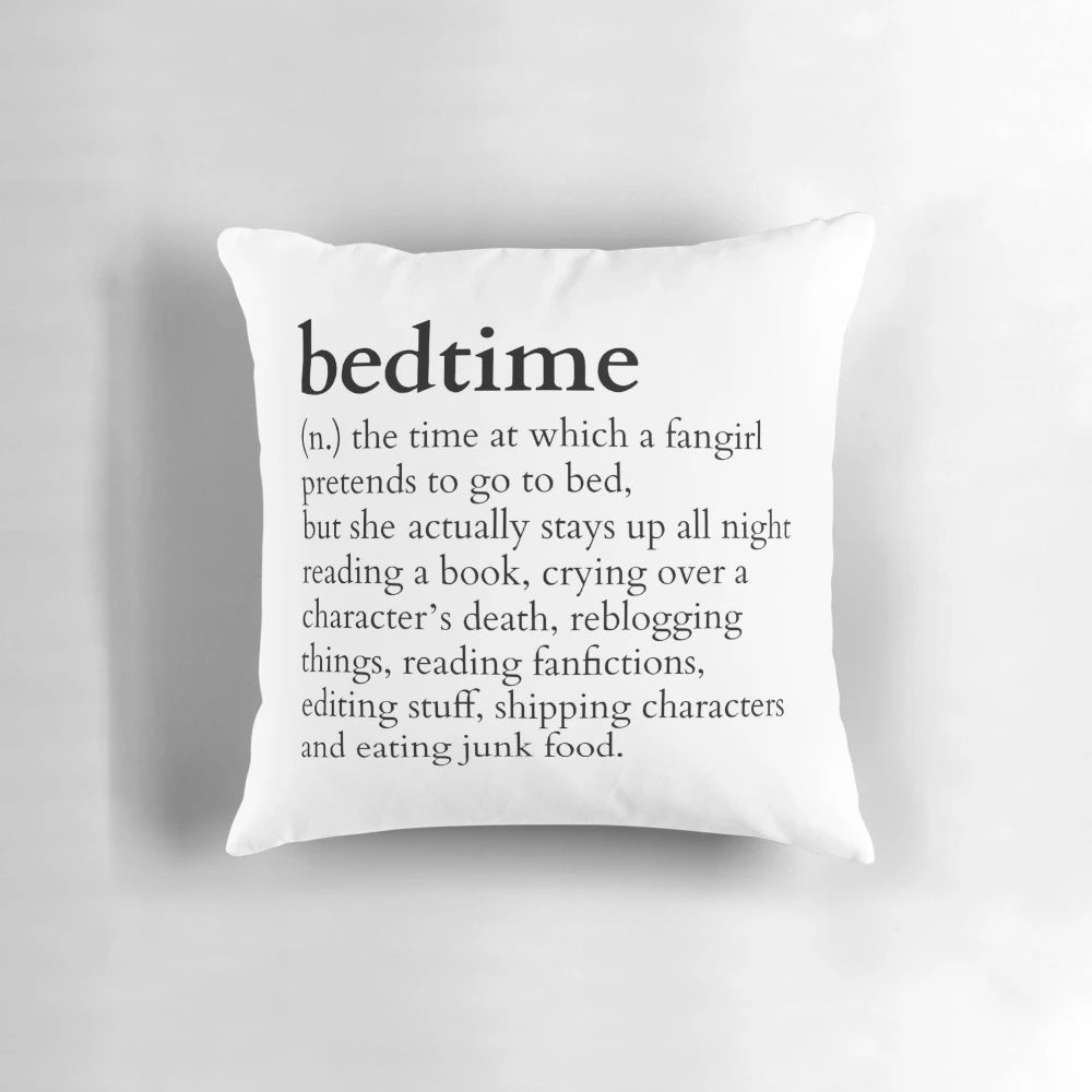 A plush pillow with a whimsical design for book lovers who stay up late reading.