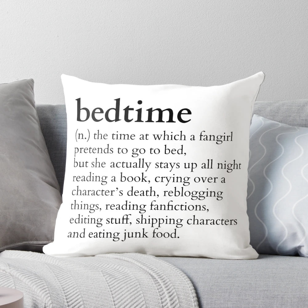 A plush pillow with a whimsical design for book lovers who stay up late reading.