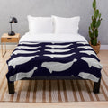 Beluga plush blanket with marine life design