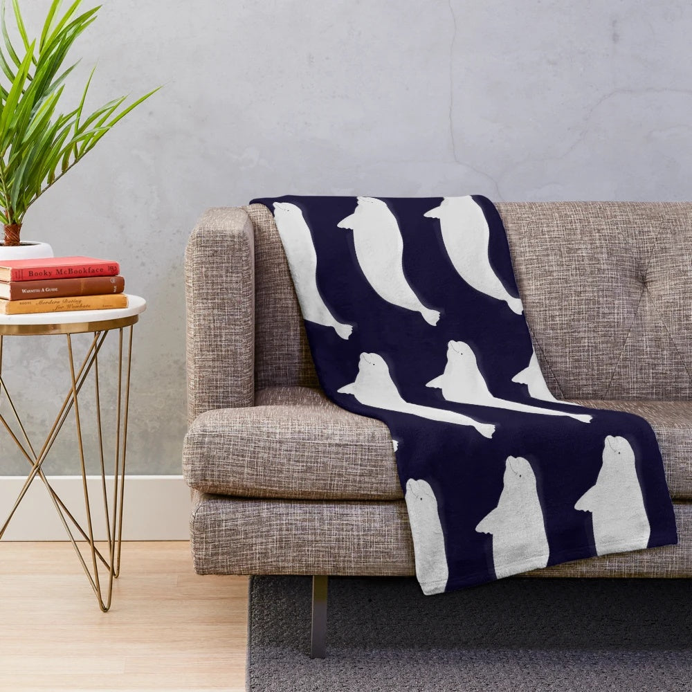 Beluga plush blanket with marine life design