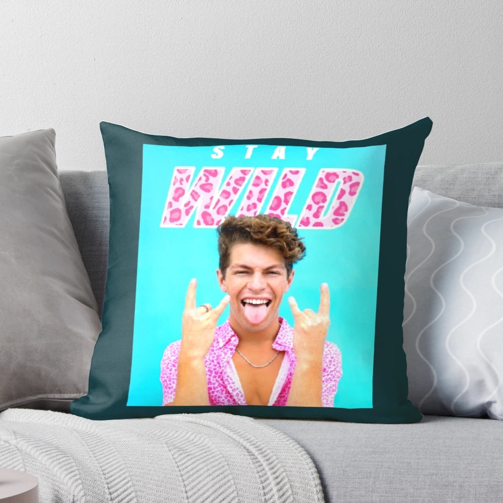 Soft, fluffy decorative pillow featuring the "Stay Wild" design by Ben Azelart, perfect for adding a nature-inspired touch to any room.