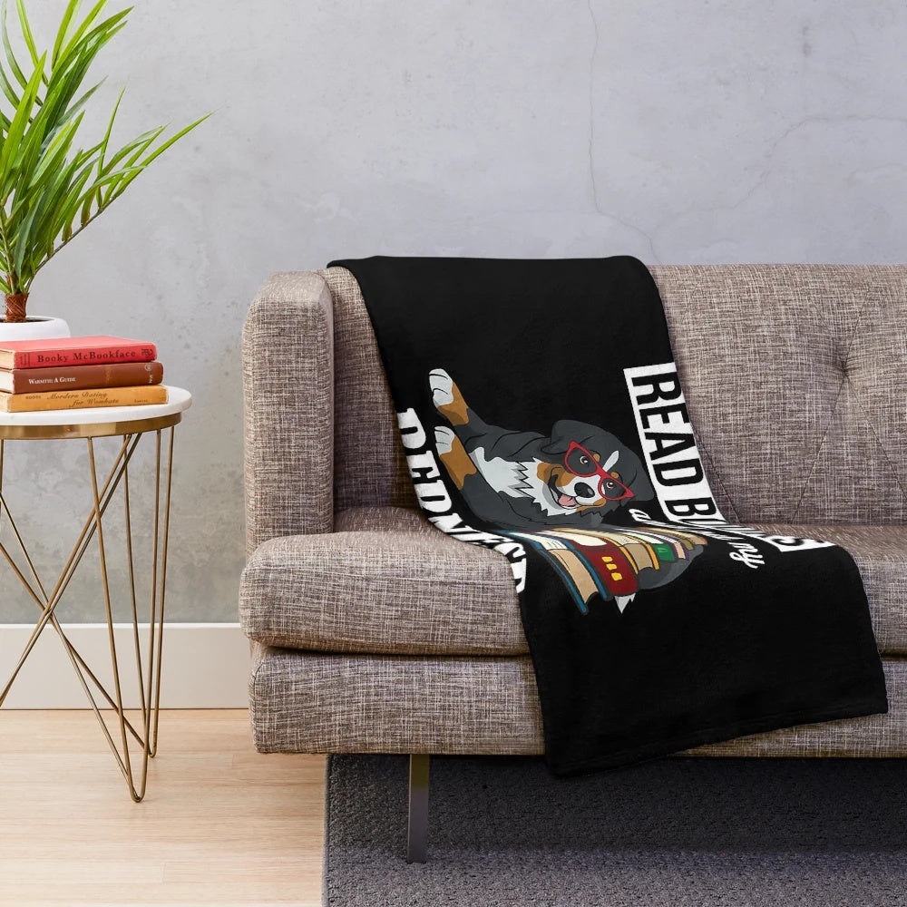 Cozy and soft Bernese Mountain Dog plush blanket for book lovers