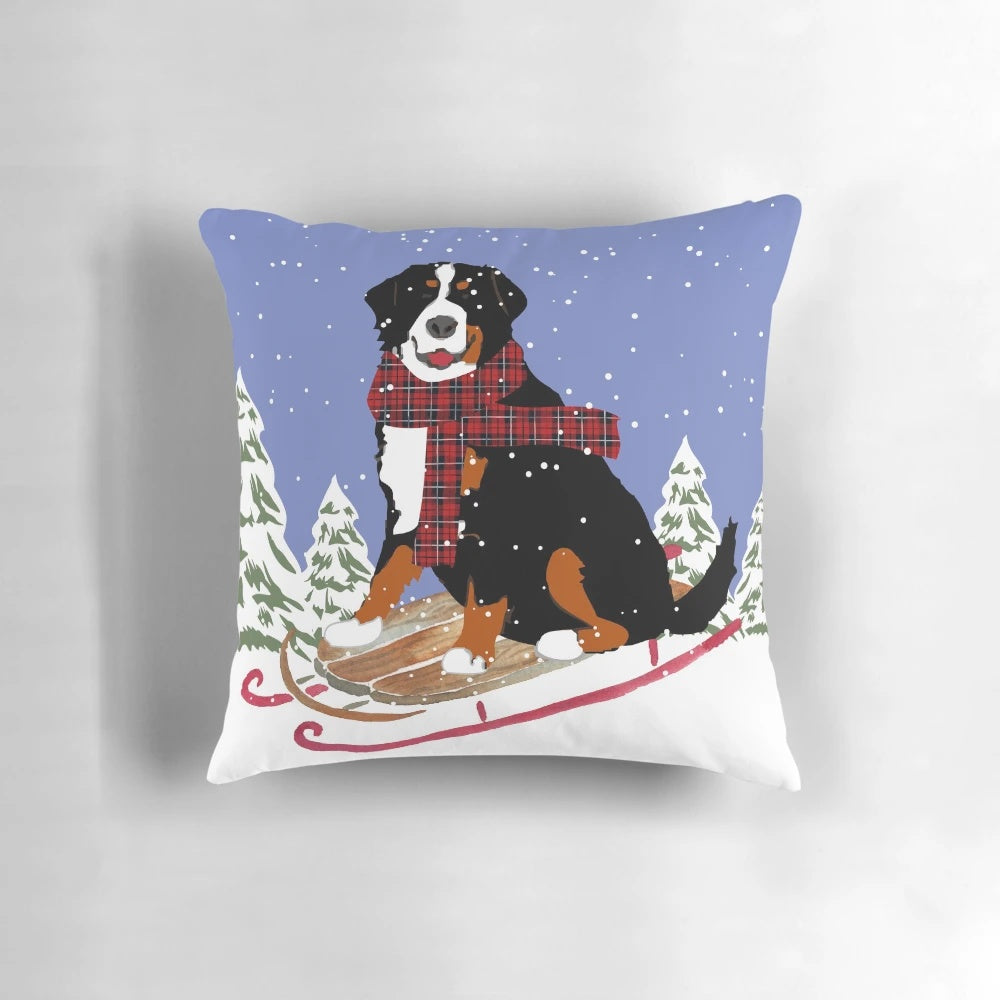 Soft plush pillow featuring a Bernese mountain dog in a winter sledding scene