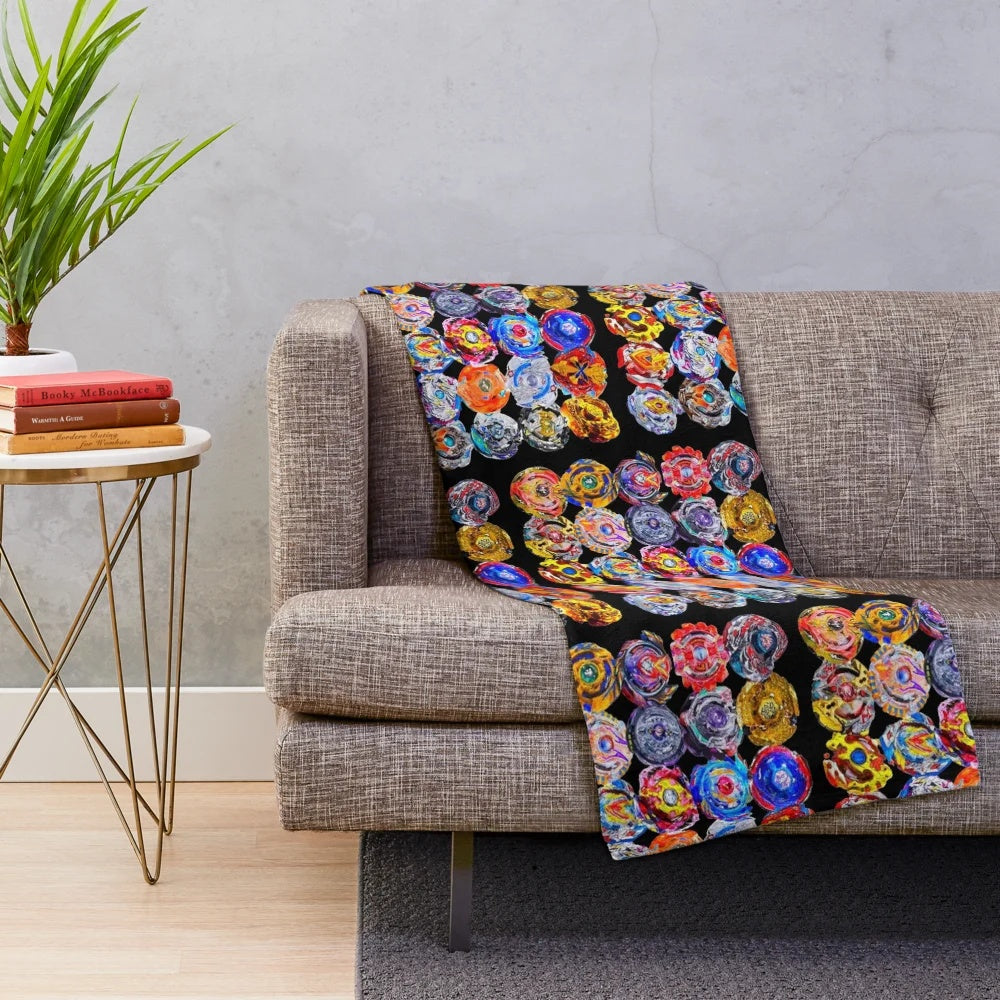 Beyblade Burst inspired plush blanket featuring characters and designs from the popular anime series