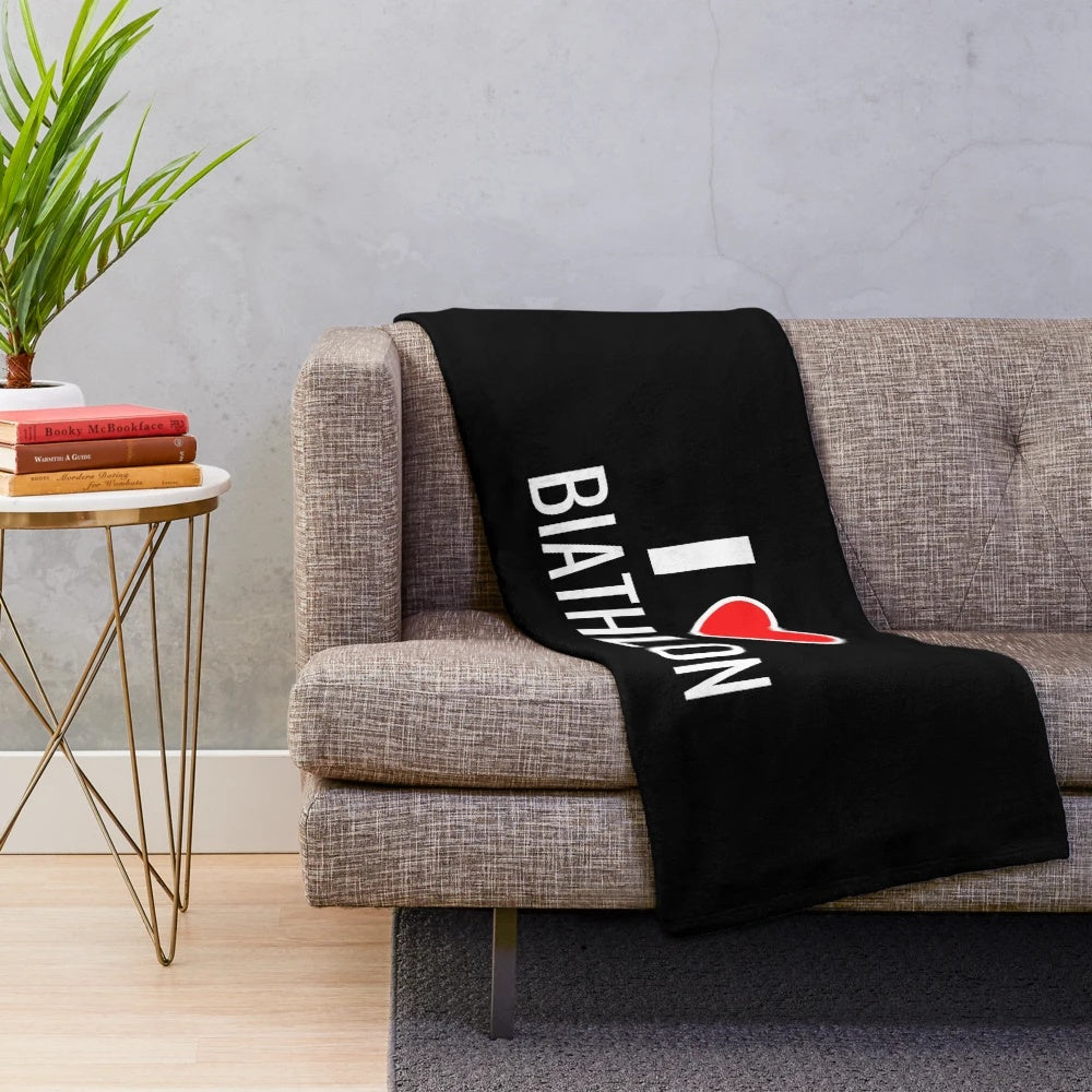 Biathlon plush blanket with red heart design
